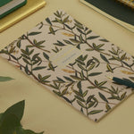 A5 soft-touch notebook with an olive branch cover design, interior ruled pages