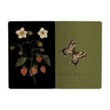 A6 passport-size pocket notebook with a Forest Flowers cover, detail view