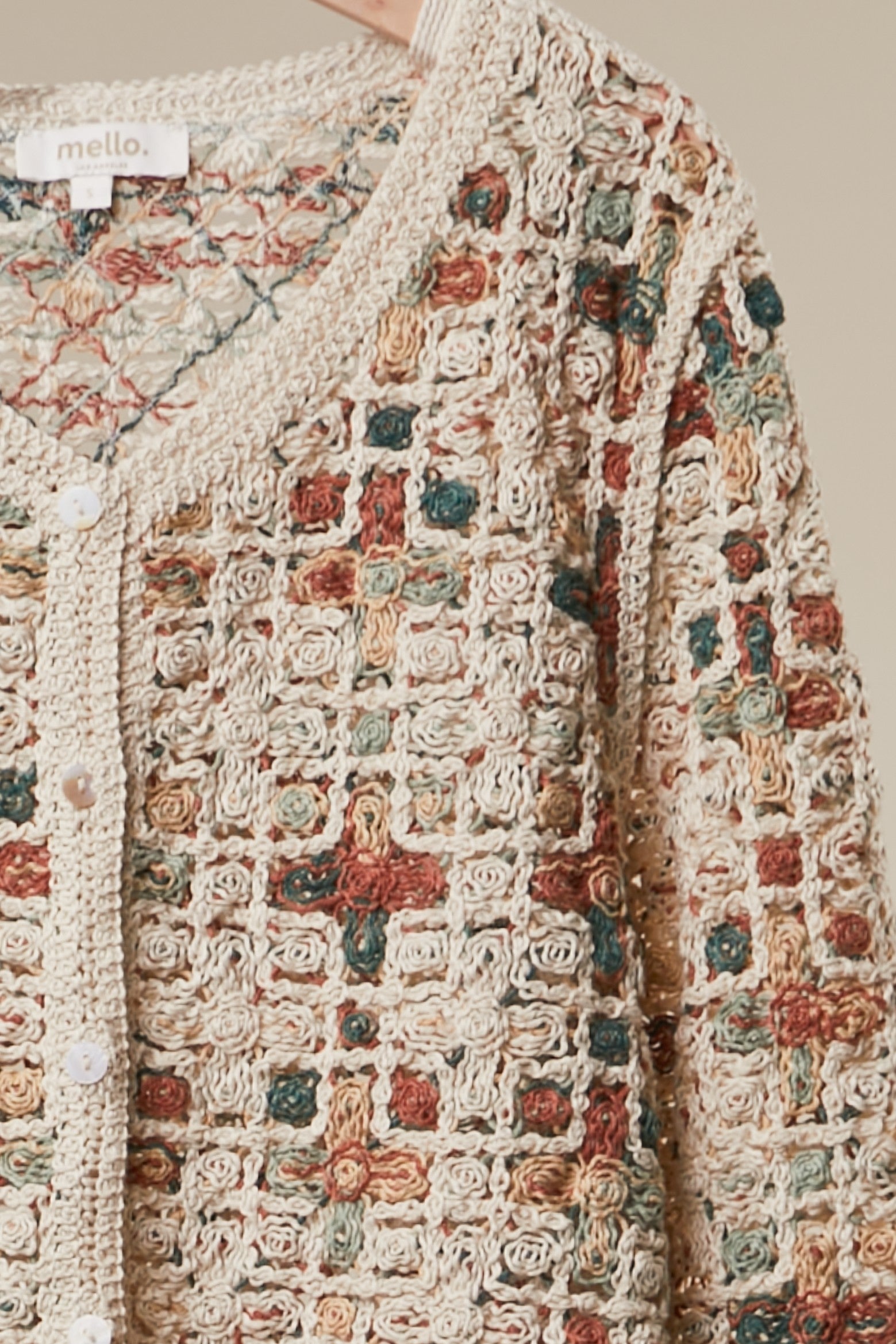 Boho Patchwork Crochet Button Cardigan in Ivory - crochet button placket detail