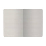 A6 passport-size pocket notebook with a Forest Flowers cover, detail view