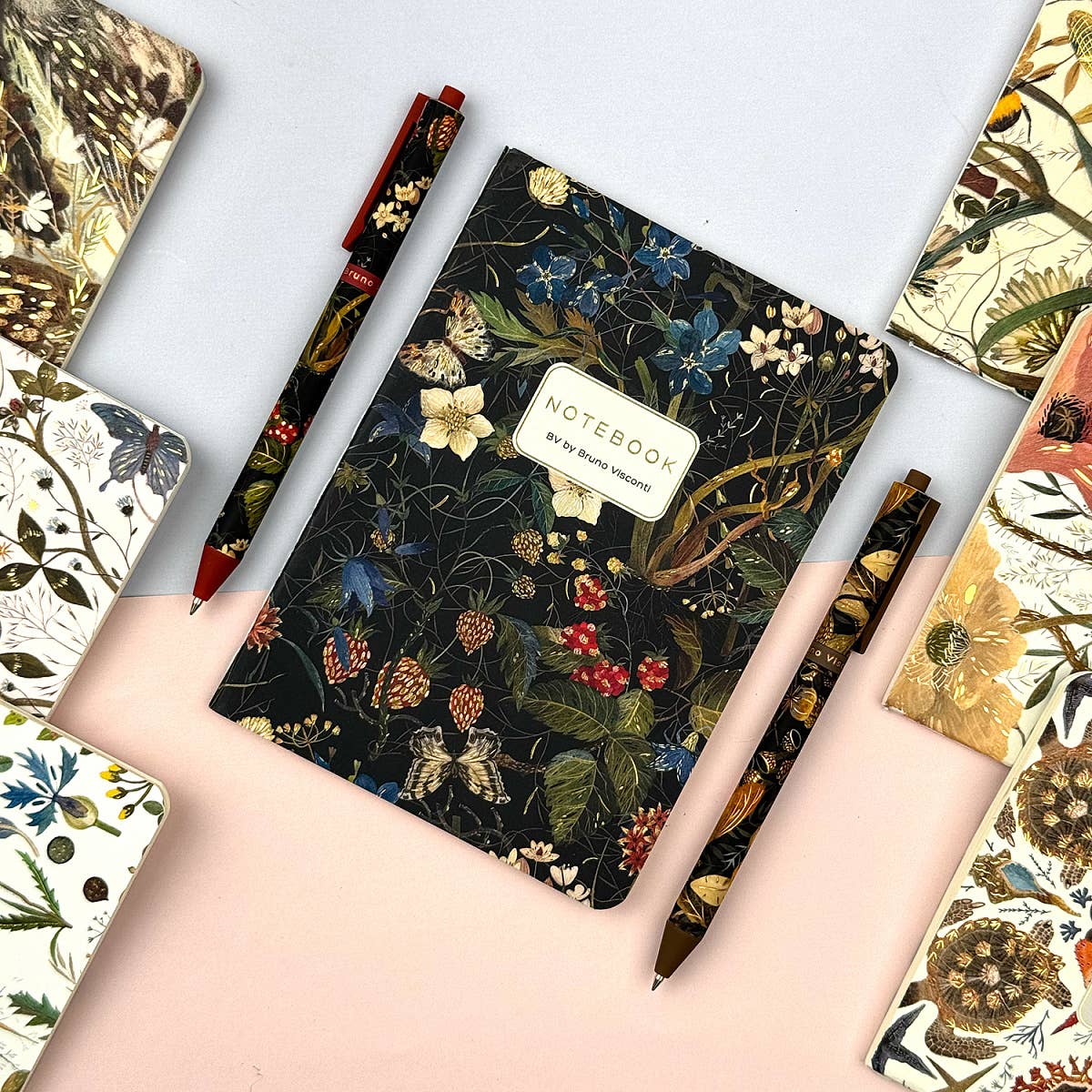 A6 passport-size pocket notebook with a Forest Flowers cover, detail view