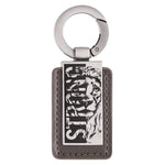 Strong gray faux leather keychain with engraved silver lion plate and Joshua 1:9