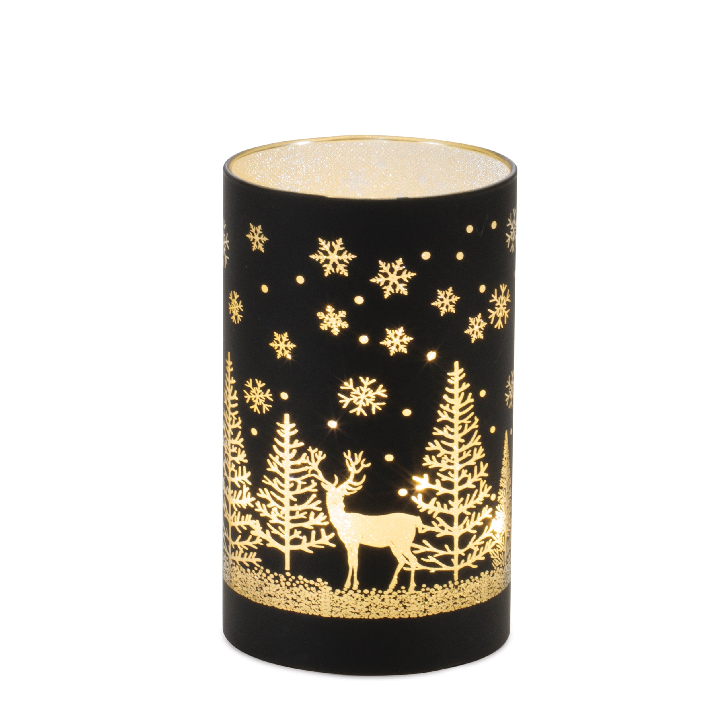Shorter black luminary with a gold snowflake and deer forest scene, glowing from inside