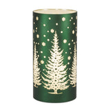 Tall deep green luminary with frosted white pine trees and falling snow dots