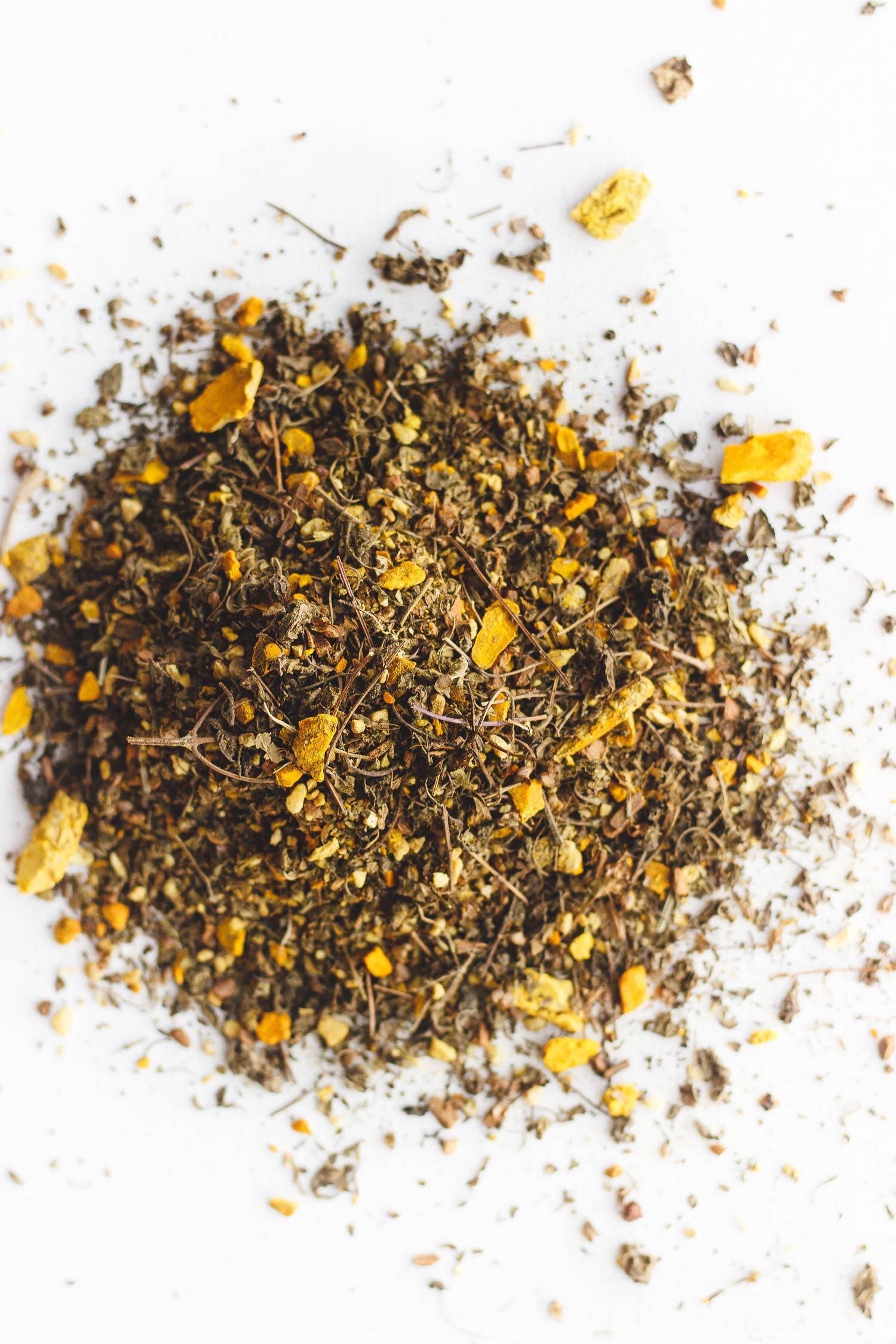Loose turmeric, ginger and peppercorn ingredients in Cup of Sunshine tea