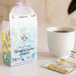 The Tea Spot green tea sampler box with five pyramid sachets