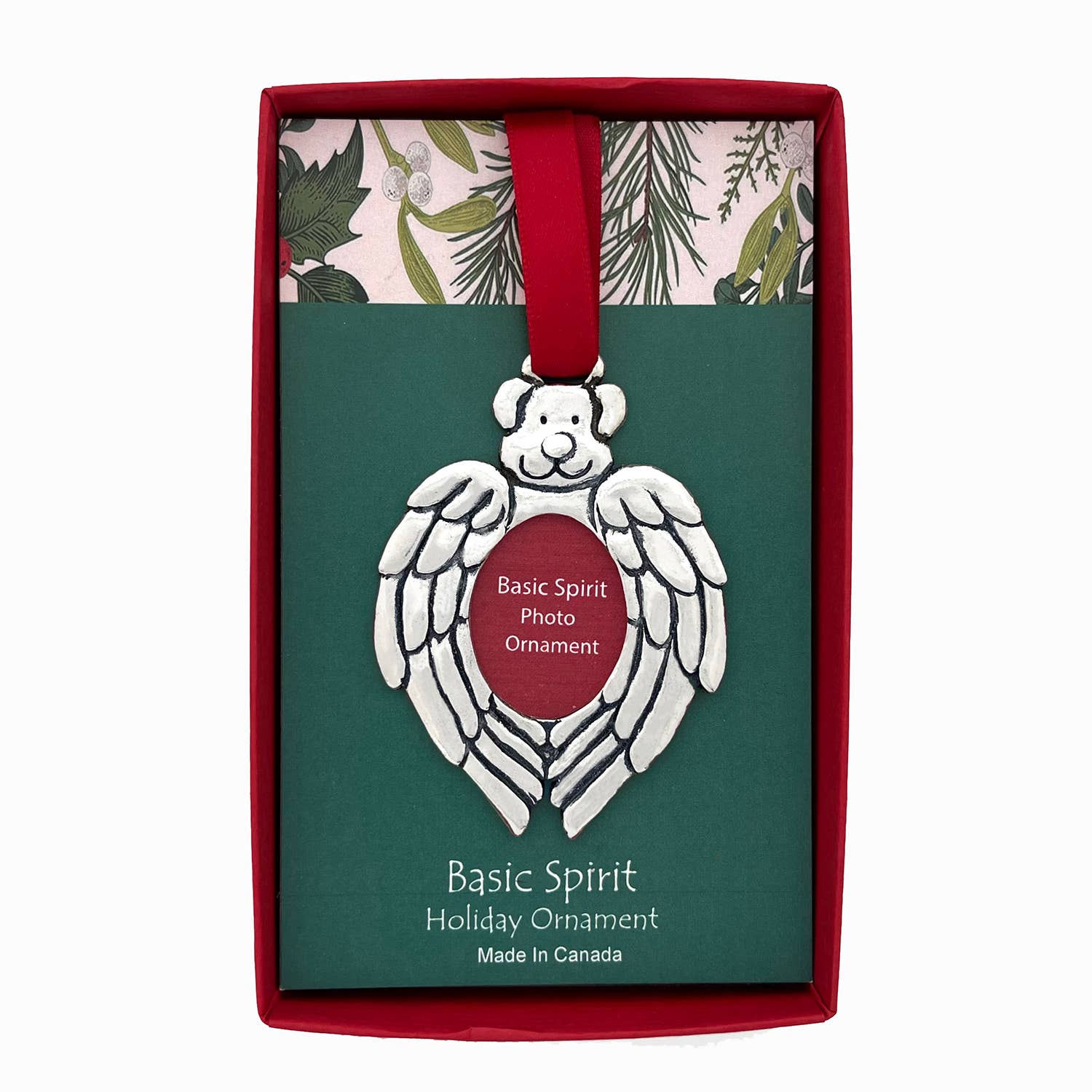 Pewter dog face with angel wings and a photo opening, on red ribbon in a green floral gift box