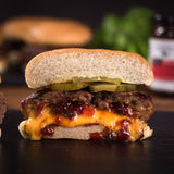 Cheeseburger stuffed with Hot Pepper Bacon Jam, sliced in half