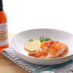 Chicken breast with Hot Pepper Peach Bourbon Sauce, lemon and cilantro