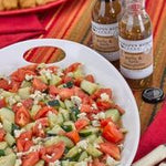 Salad dressed with Garlic & Herb Vinaigrette with pita chips