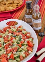 Salad dressed with Garlic & Herb Vinaigrette with pita chips