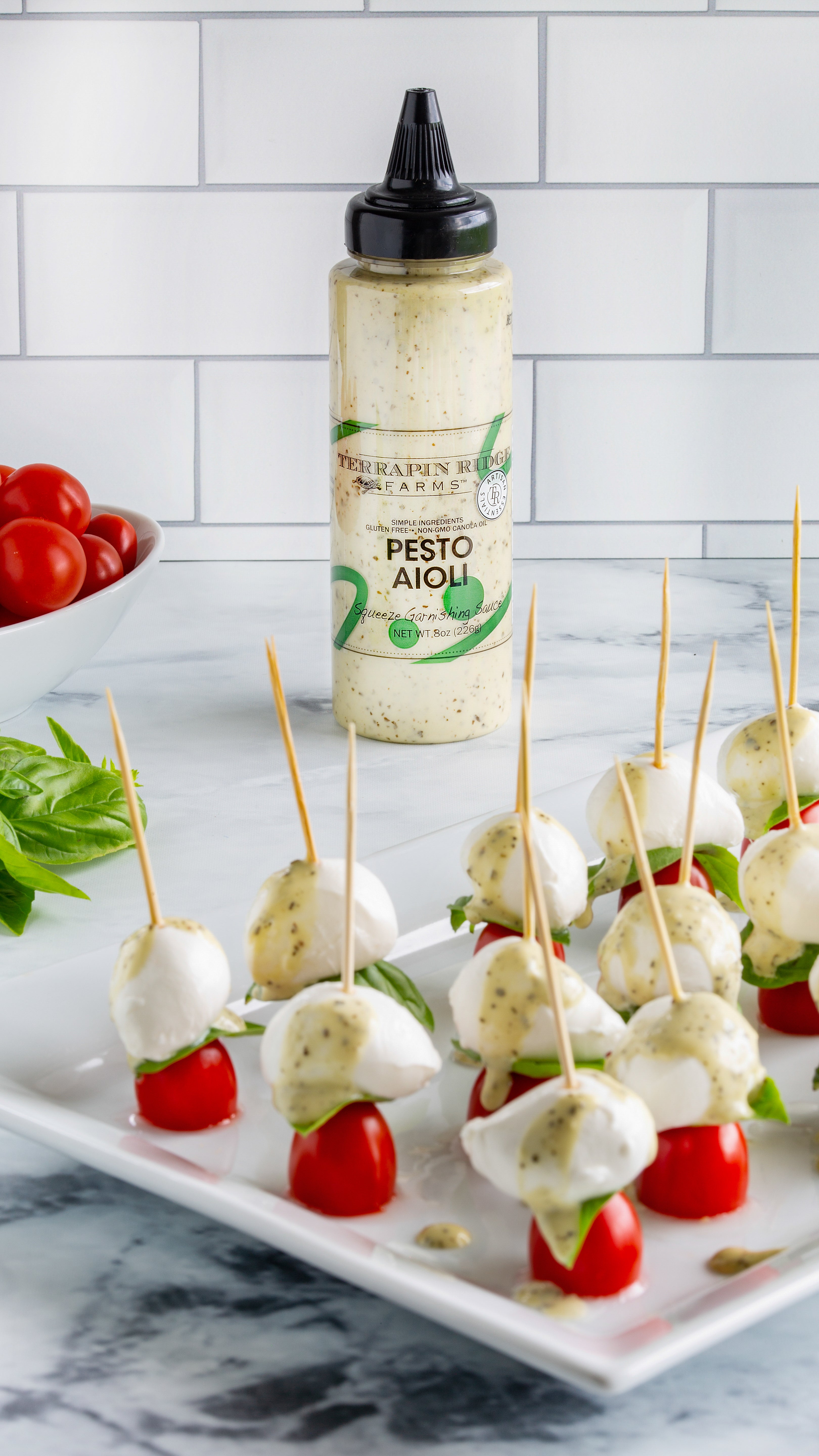 Caprese skewers served with pesto aioli
