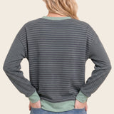 Color accent micro brushed stripe sweater in sage - front view