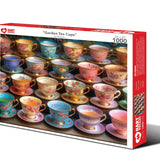 Garden Tea Cups 1,000-piece jigsaw puzzle box showing rows of floral hand-painted porcelain tea cups with gold rims