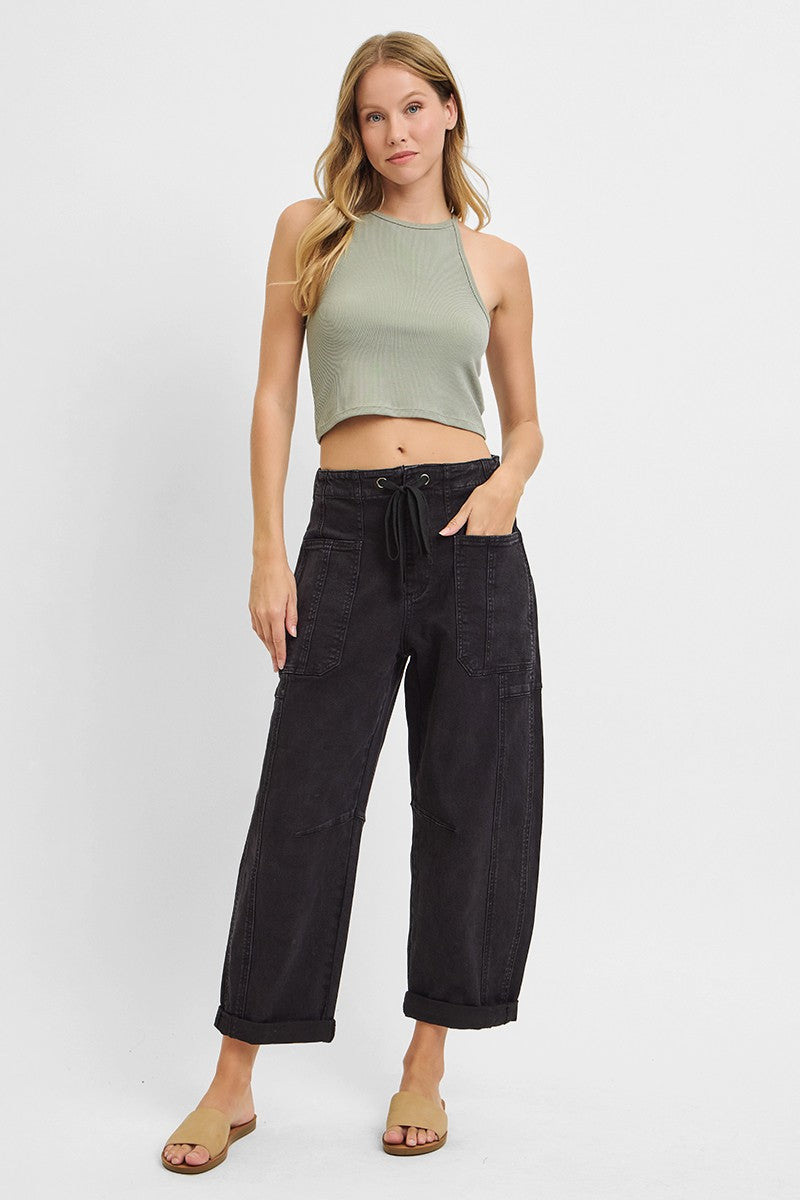High rise cropped barrel leg cargo jeans in black denim, front view