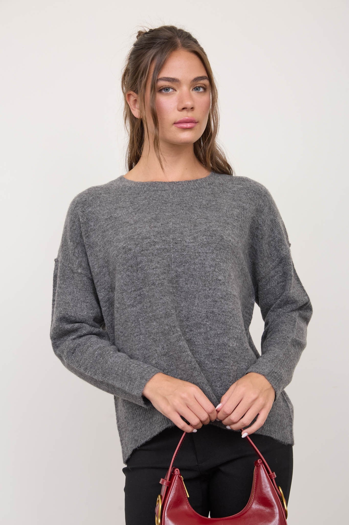 Solid Crewneck Front Seam Knit Sweater in Dark Grey - front view styled