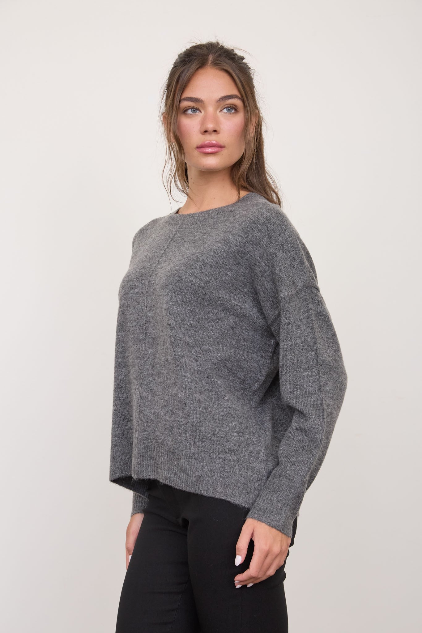 Solid Crewneck Front Seam Knit Sweater in Dark Grey - three-quarter view