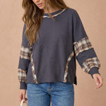Oversized Thermal Knit Top with Plaid Flannel Contrast in Charcoal - side slit detail