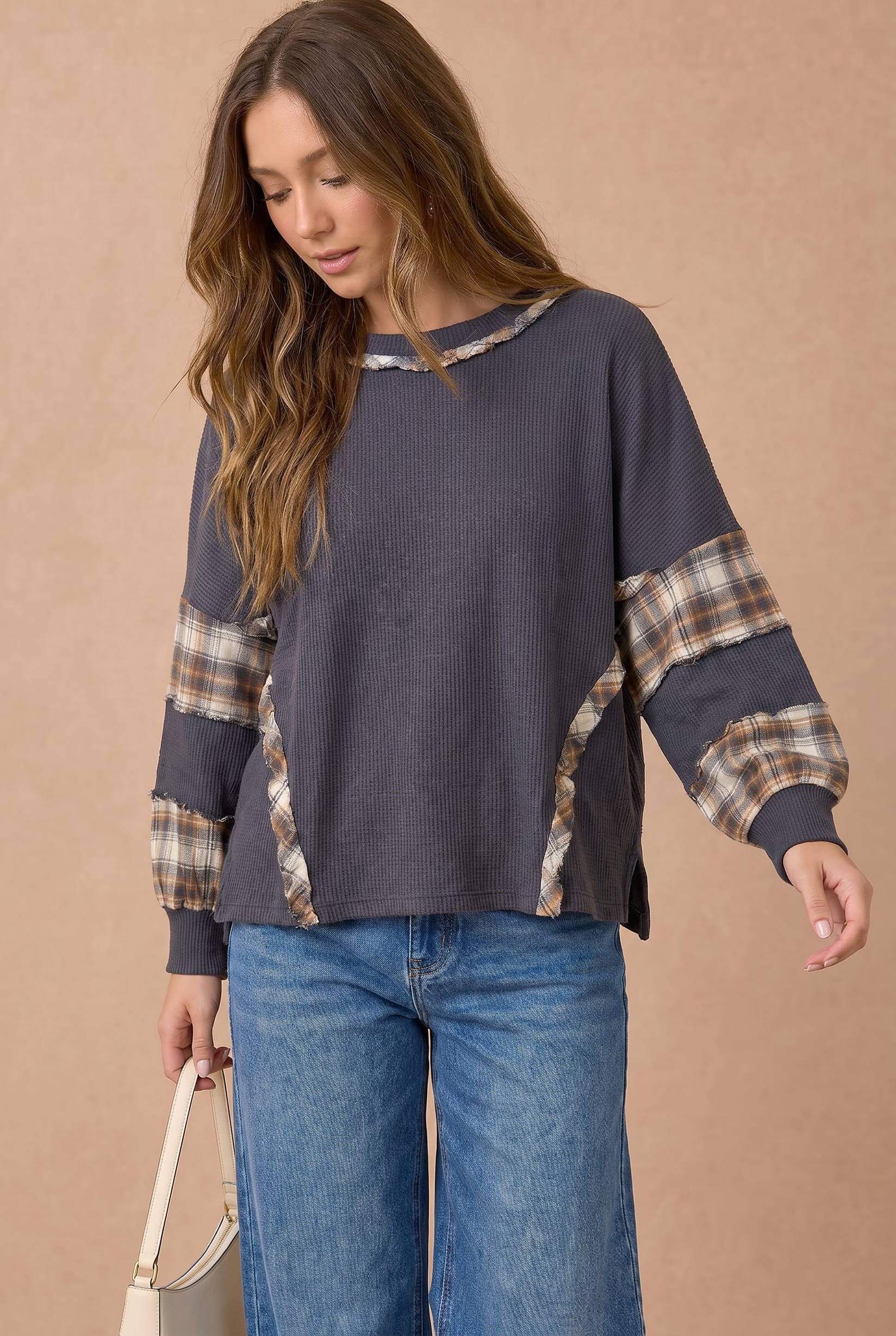 Oversized Thermal Knit Top with Plaid Flannel Contrast in Charcoal - side slit detail