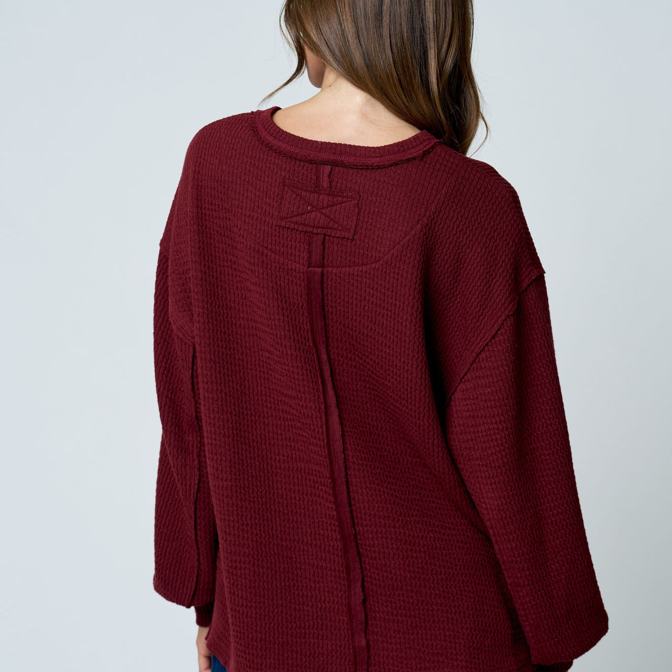 Textured Exposed Seam Long Extended Sleeve Knit Top - Burgundy