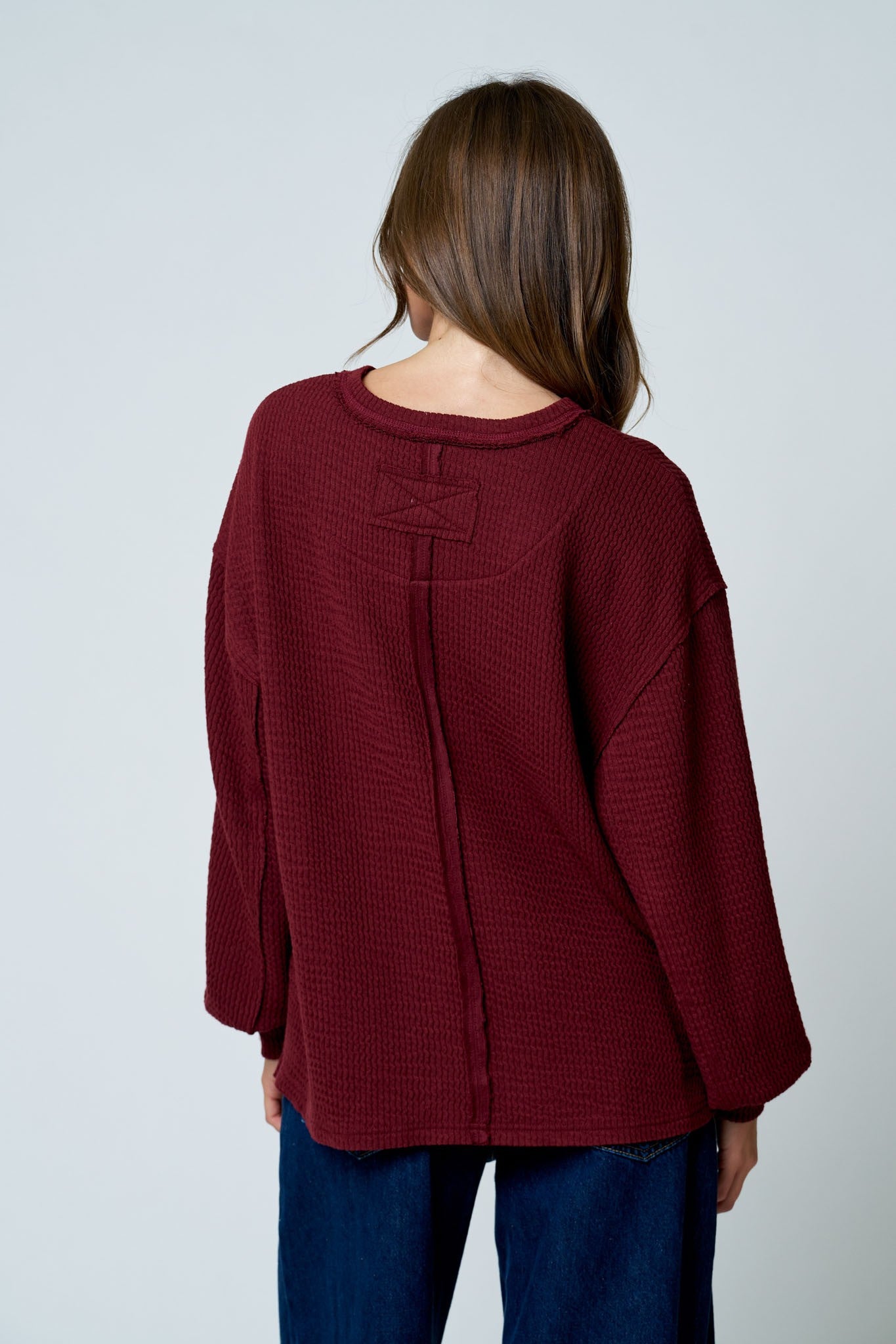 Textured Exposed Seam Long Extended Sleeve Knit Top - Burgundy
