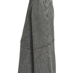 Side view of washed French terry flare pant showing wide leg and raw hem