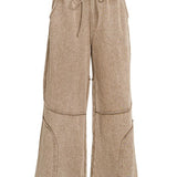 Washed French terry wide-leg flare pant with drawstring waist and exposed seam detail