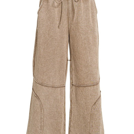 Washed French terry wide-leg flare pant with drawstring waist and exposed seam detail