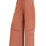 Washed French terry flare pant shown with flat sandals