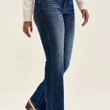Judy Blue Daisy bootcut jeans front view, dark wash denim with harness trim waistband