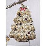 Light seed tree with cranberries and a red bow hanging from a branch