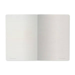 A5 ruled notebook with a galaxy and starfield cover design, detail view