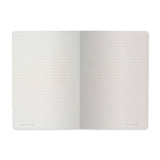 A5 ruled notebook with a galaxy and starfield cover design, detail view