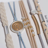 Wonder hair tie bracelet set in cream and blue with pearls and moon and stars charm, view 3