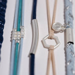 Dream hair tie bracelet set in blue and neutral tones with silver accents, view 3