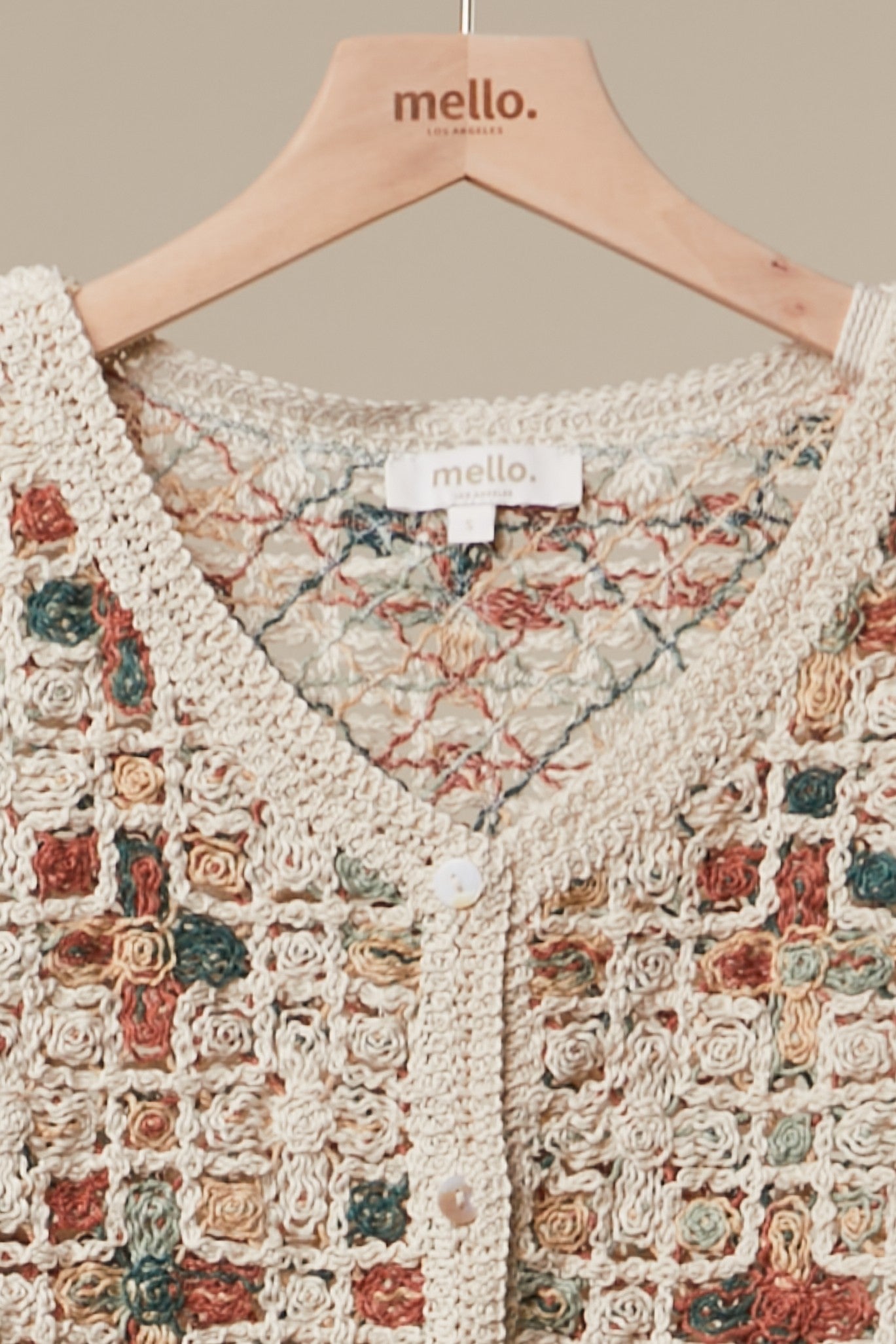 Boho Patchwork Crochet Button Cardigan in Ivory - V-neck detail