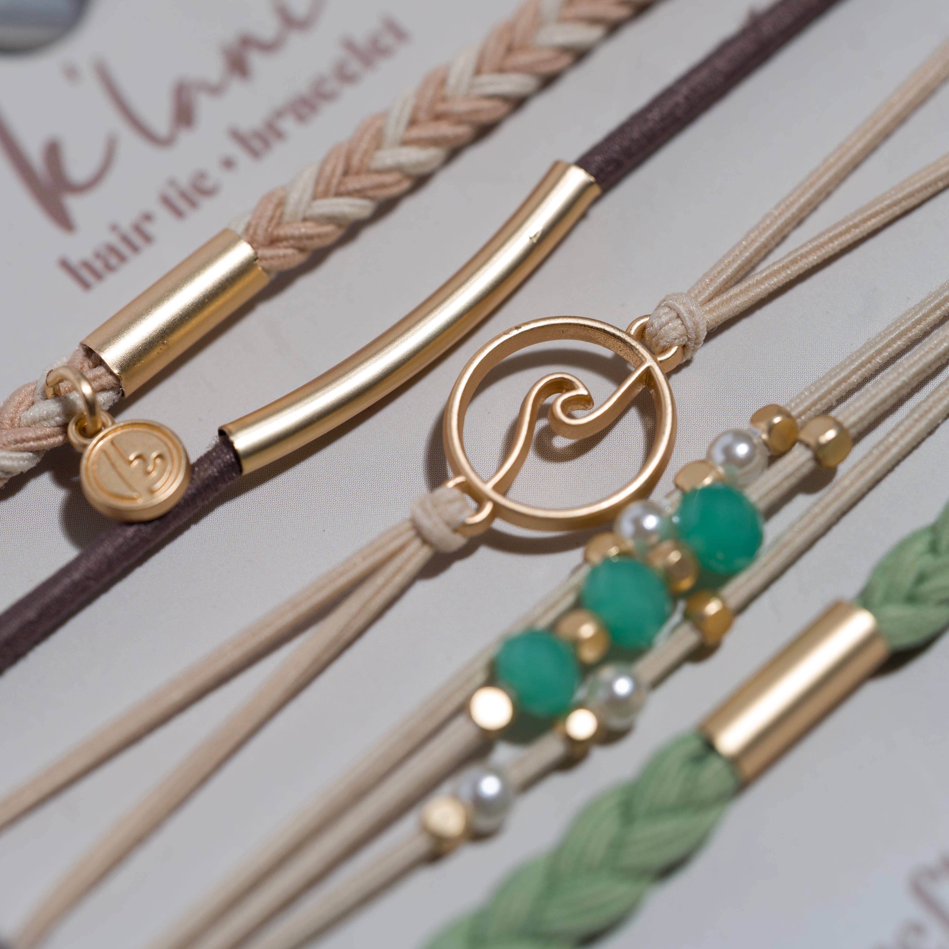 Reflect hair tie bracelet set in beachy neutrals and green with gold wave charm, view 3