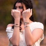 Paws hair tie bracelet set in natural tones with silver paw print charms, view 6