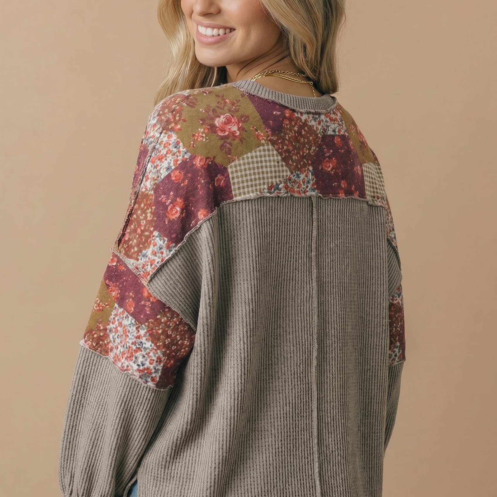 Patchwork floral print panels across the shoulders and sleeves