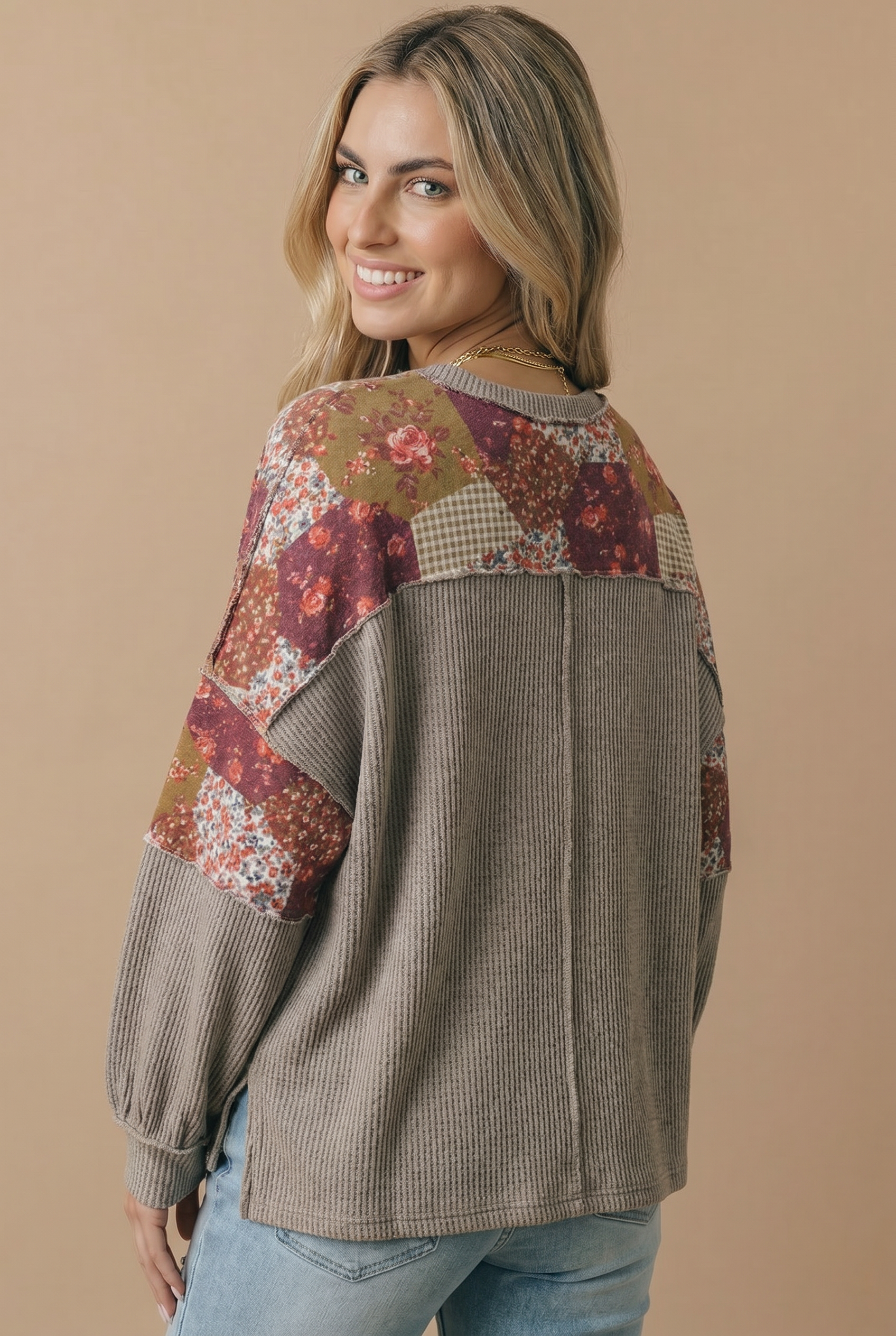 Patchwork floral print panels across the shoulders and sleeves