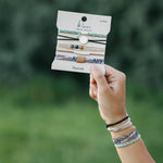 Flourish hair tie bracelet set in teal, black and tan with butterfly charm, view 7