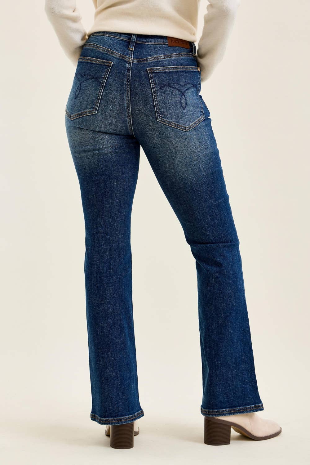 Judy Blue Daisy bootcut jeans back view in Sunset Ride dark wash