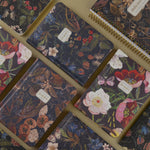 A6 vegan leather daily planner with a Forest Flowers cover and gilded page edges, detail view