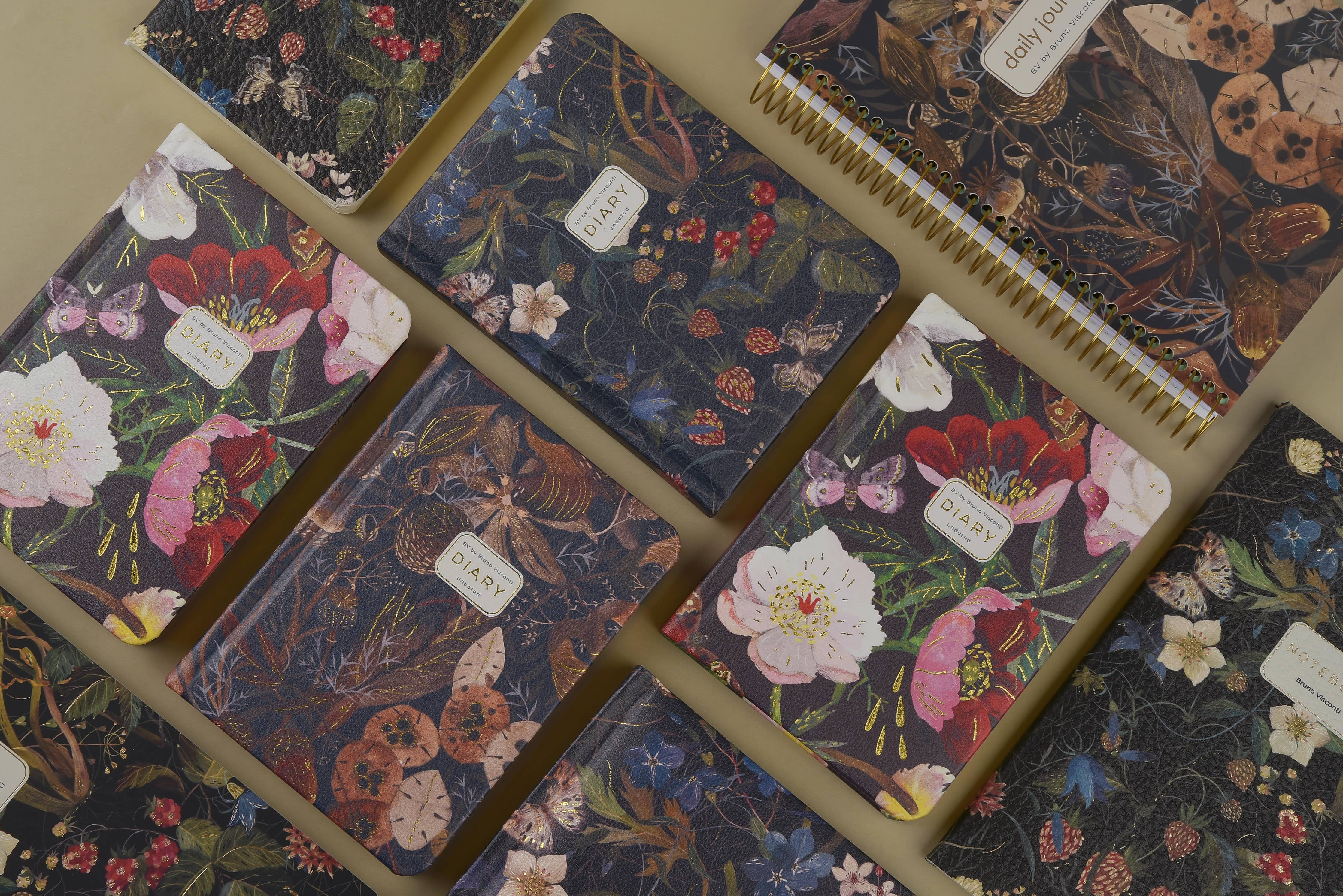 A6 vegan leather daily planner with a Forest Flowers cover and gilded page edges, detail view