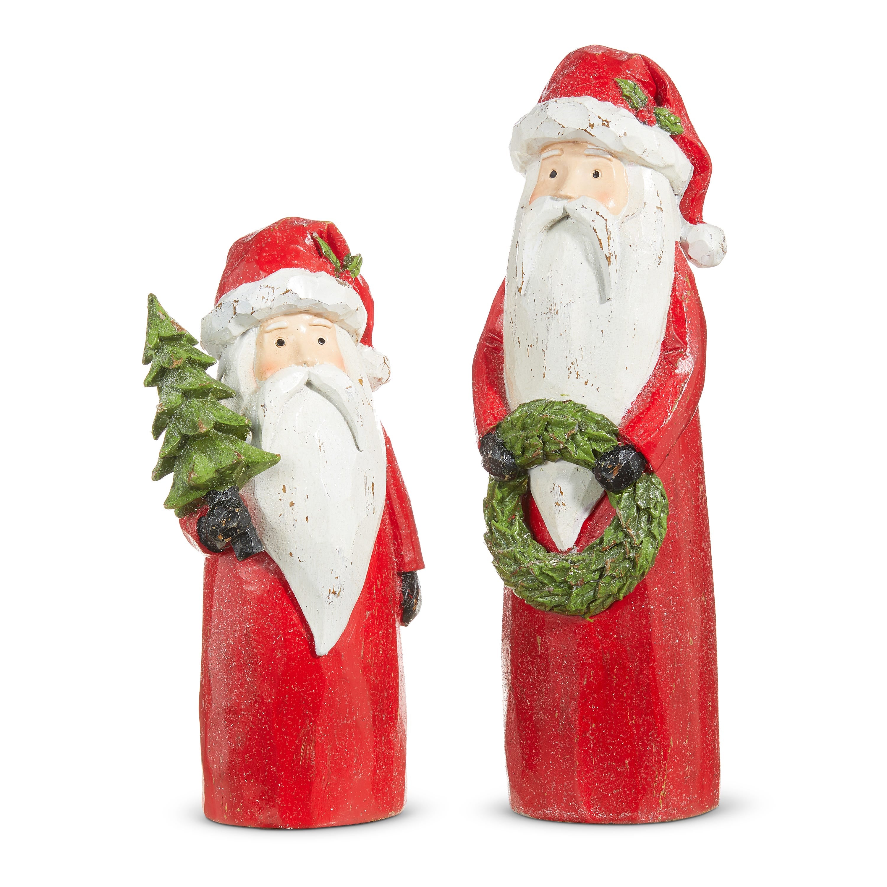 Two carved-look red Santas with long white beards, one holding a tree and one a wreath