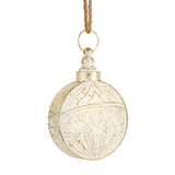Small round ivory bell brushed with gold, with a pressed pattern and jute hanger