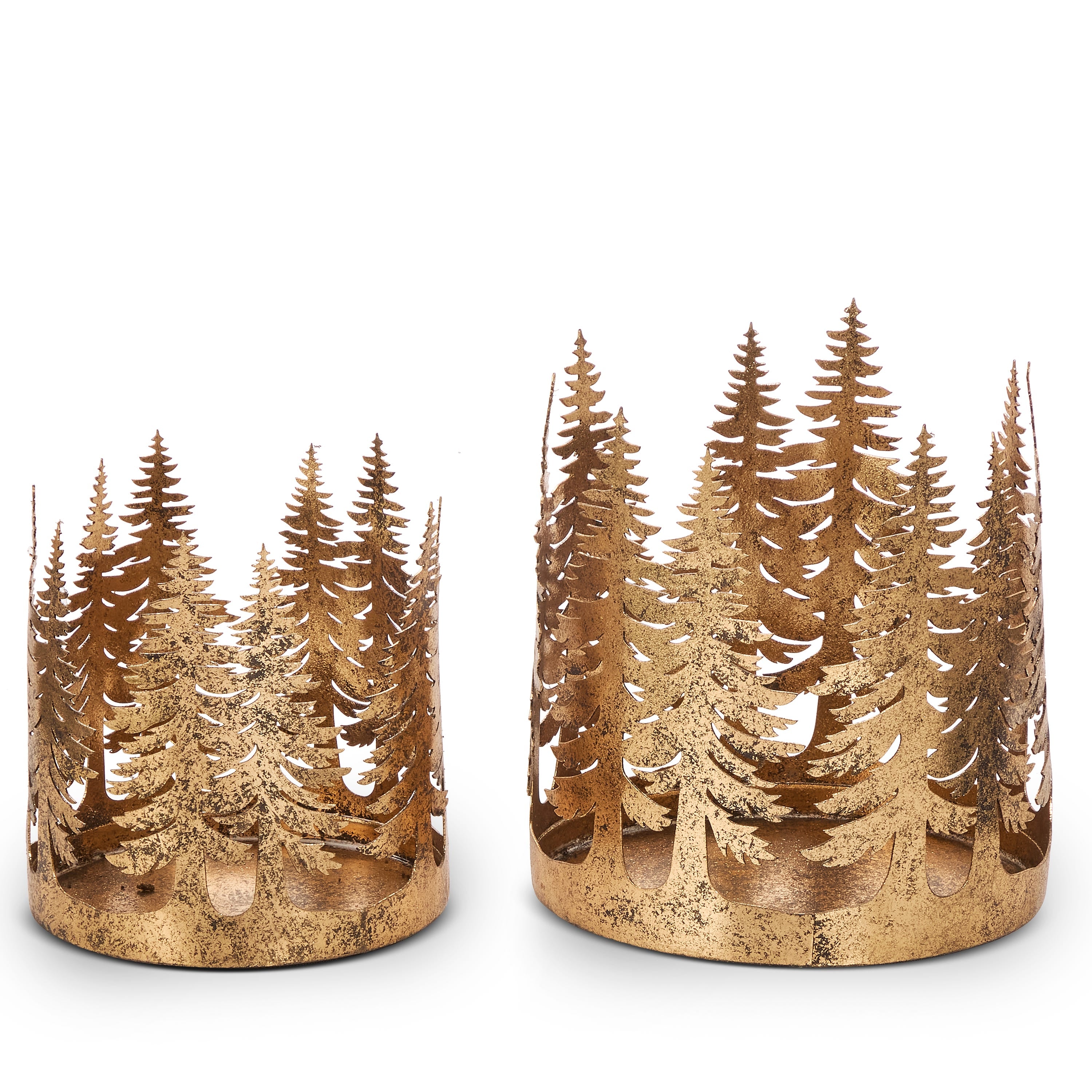 Two antique gold iron hurricanes with cutout tree silhouettes around the rim