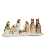 Low earthtone nativity with Mary, Joseph, the baby, and three kings standing in a row