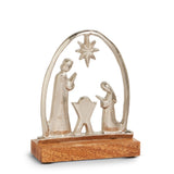Silver metal arch with Holy Family silhouettes and a star, set on a wood base