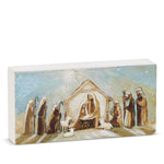 Long wood block printed with a nativity scene under a bright star